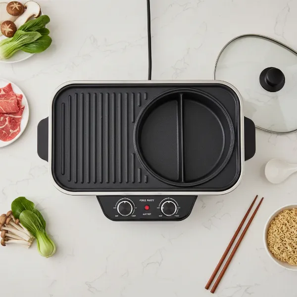 A Food Party 2-in-1 electric smokeless grill and hot pot appliance on a kitchen counter.