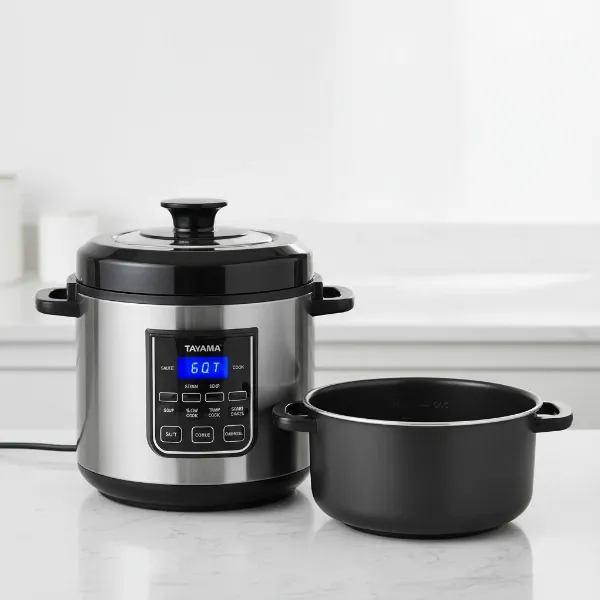 Tayama electric multi cooker TMC-60XL with stainless steel finish, displaying its compact and modern design.